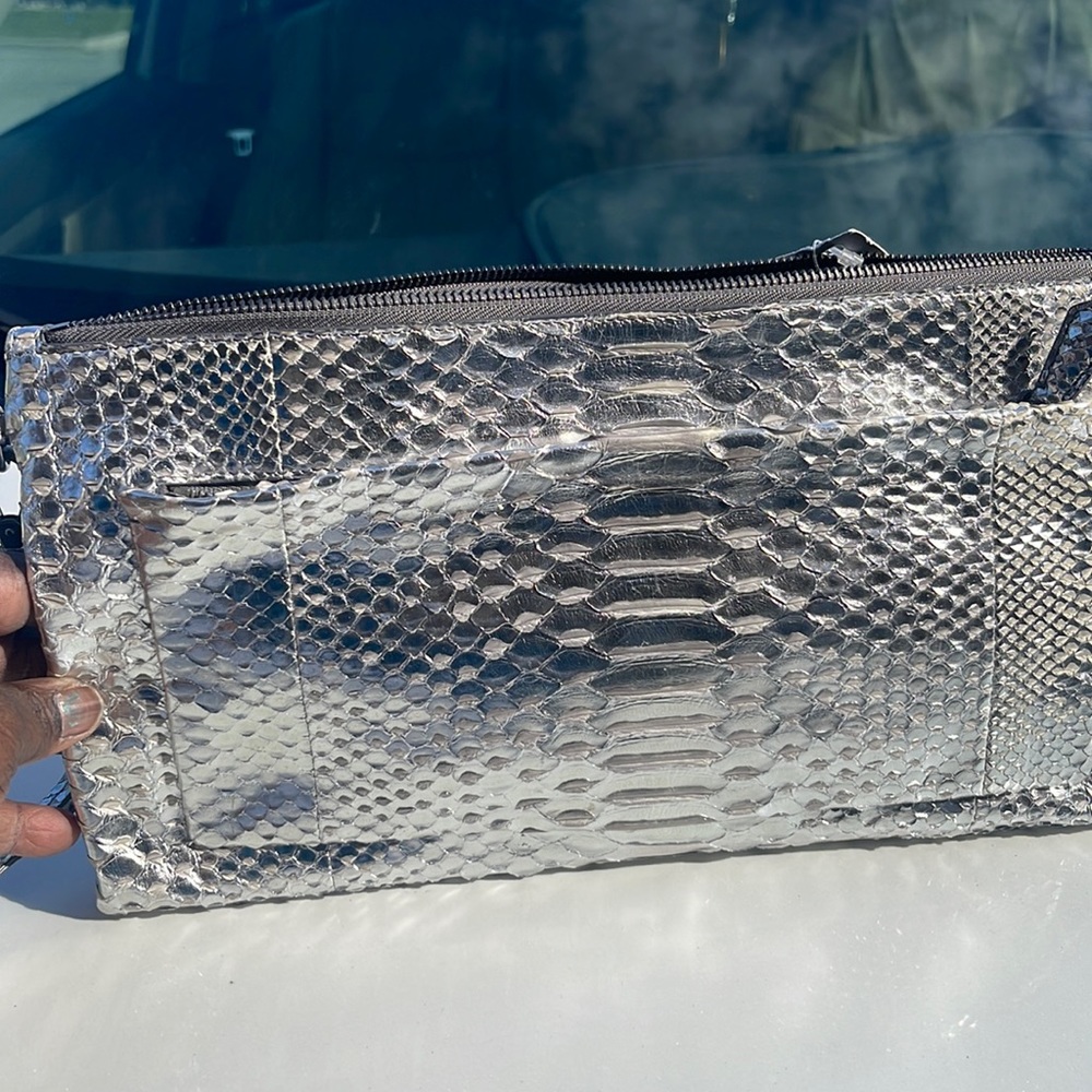 Reed Krakoff silver clutch  purse.